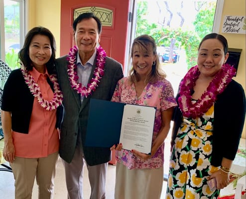 Staff and residents celebrating a milestone event