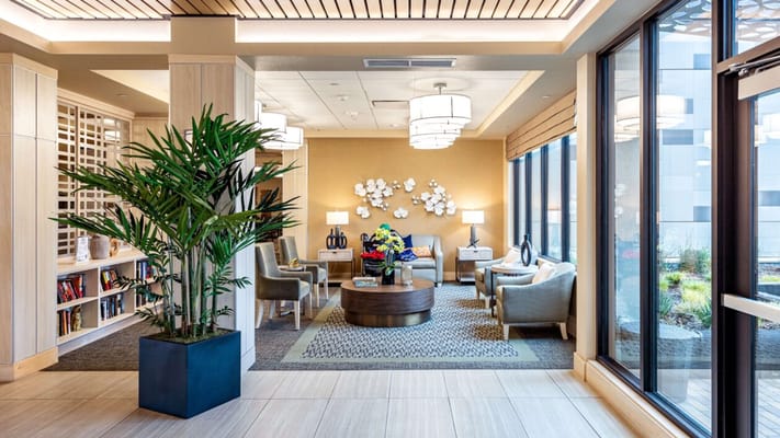 Bright interior lobby with seating and decor