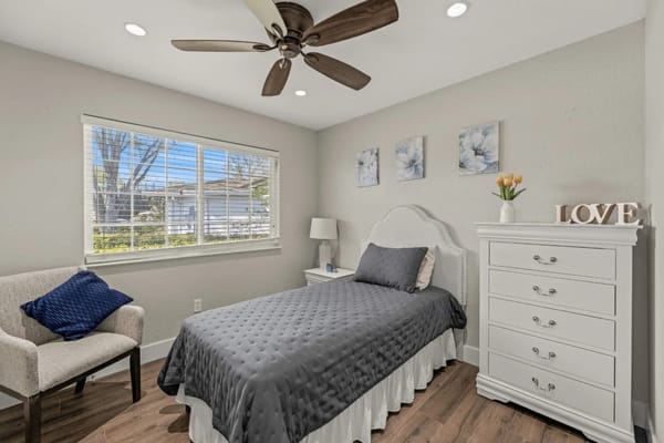 Cozy resident room with bed and decor