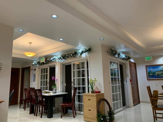 Interior view of a decorated hallway in a care home