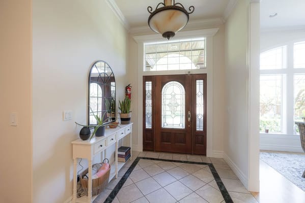 Bright interior entrance with a decorative console table