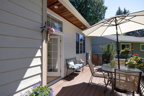 Outdoor seating area with a table and chairs