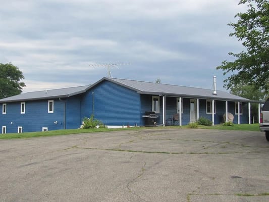 Blue exterior of Kerak & Hilltop Assisted Living facility