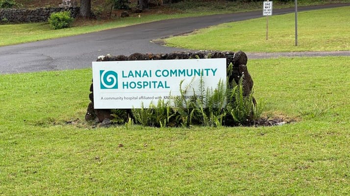 Sign for Lanai Community Hospital in a grassy area