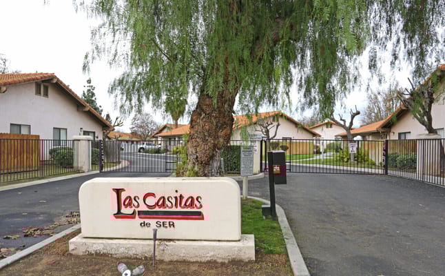 Entrance sign of Las Casitas Retirement Village