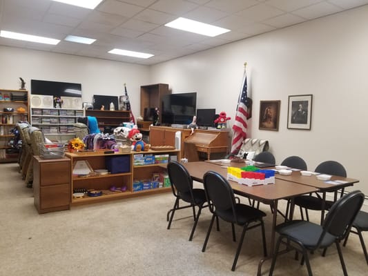 Common area with seating and activities in the senior facility