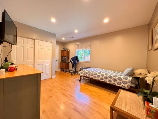 Private resident room with a bed and furniture