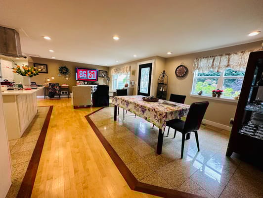 Bright interior common area with a dining table
