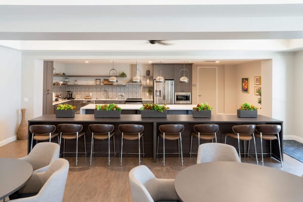 Modern communal kitchen space in a senior living facility