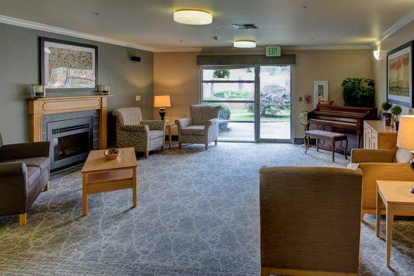 Comfortable common area with seating and natural light