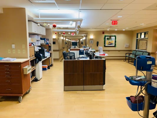 Well-lit hallway in a nursing home with decorations