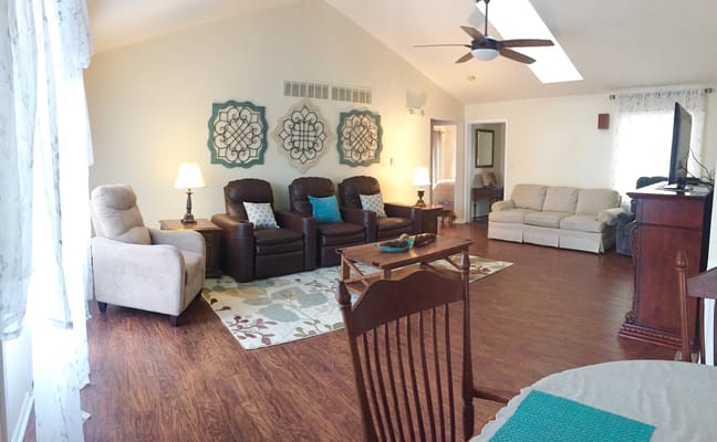 Bright common area with seating and decor