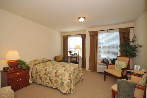 Cozy private resident room with floral bedding