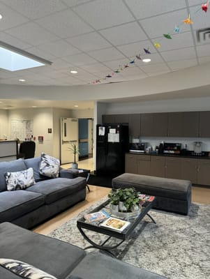 Common area with seating and kitchenette.