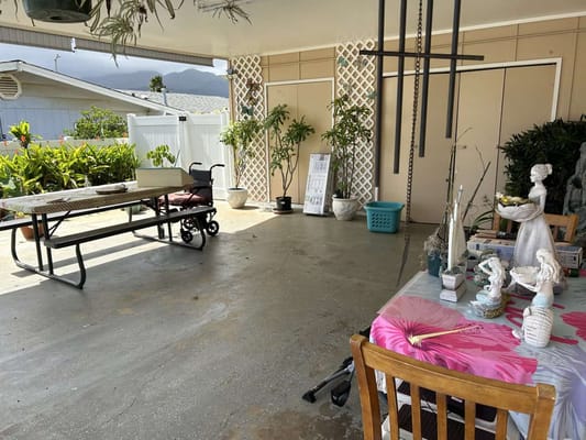 Spacious outdoor patio with seating and plants