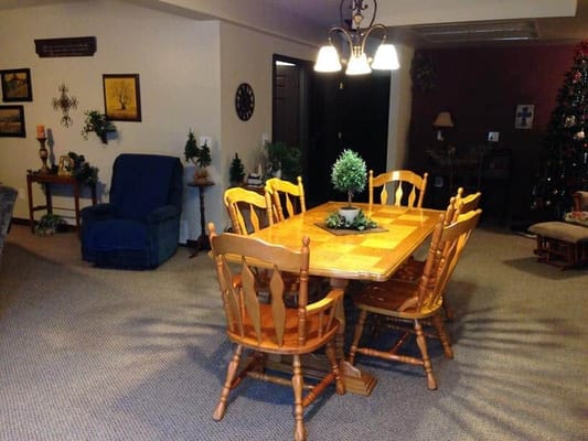 Cozy common area with a dining table and chairs