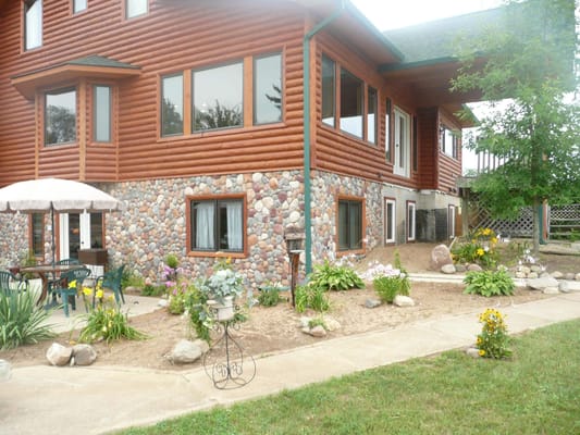 Exterior view of ShadowTree Lodge with garden