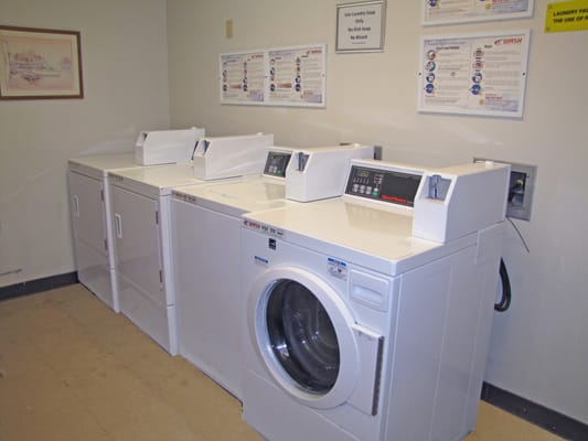 Laundry machines in a clean facility laundry room