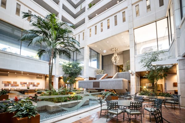 Spacious lobby with modern design and greenery