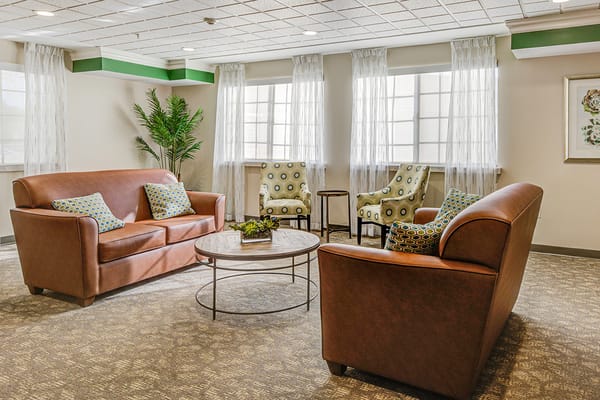 Comfortable common area with seating and natural light