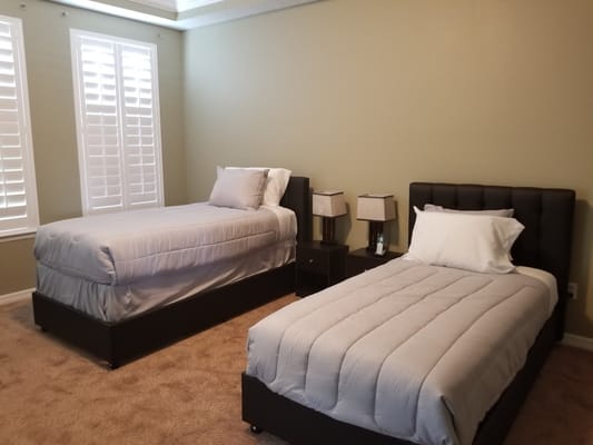 Interior of a shared resident room with two beds
