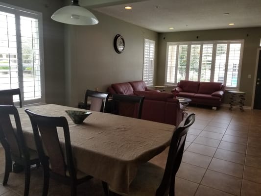 Common area with seating and dining table