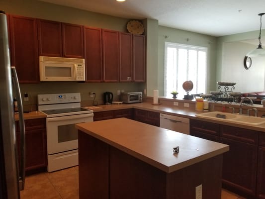 Interior kitchen with appliances and countertops