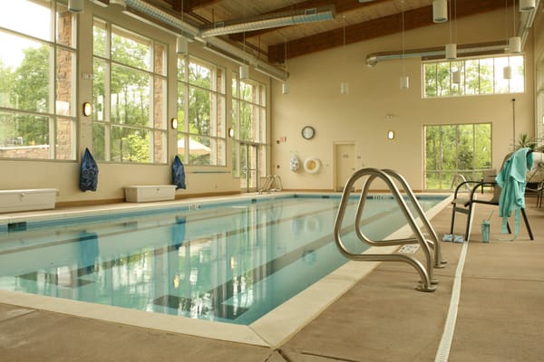 Indoor pool area with natural light