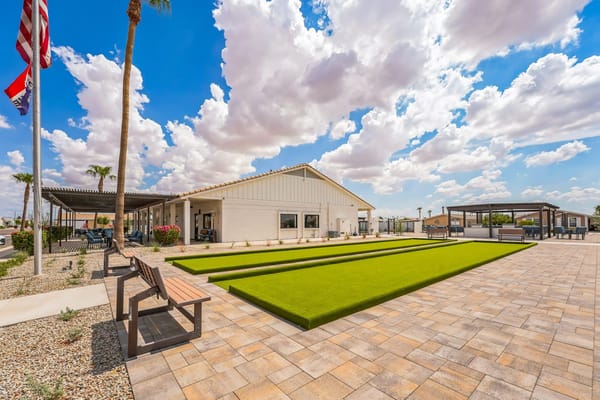 Outdoor space with benches and landscaped area