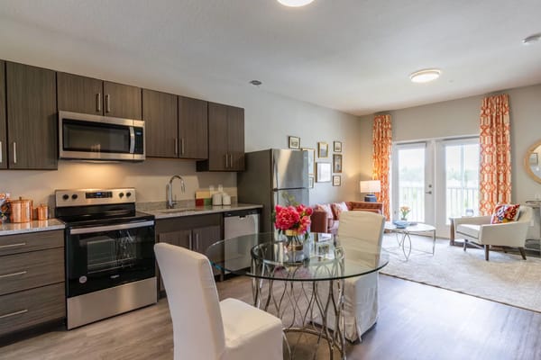 Cozy kitchen and dining area in a senior living apartment