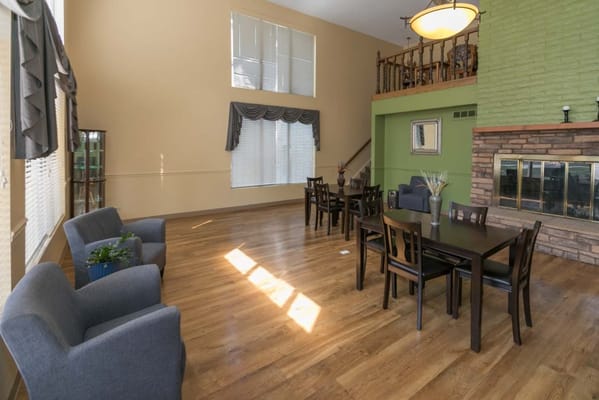 Bright common area with seating and natural light