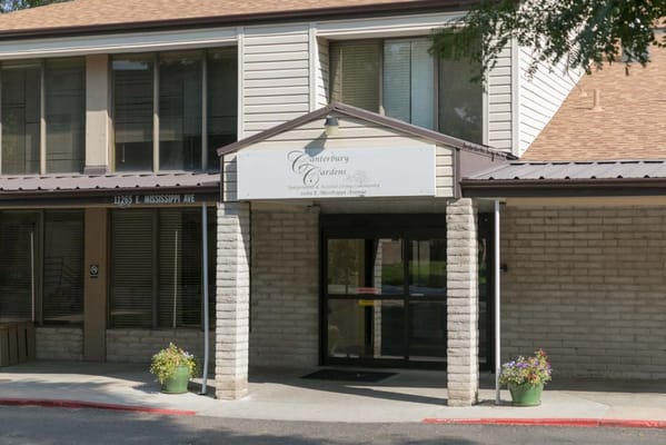 Entrance of a senior living facility with signage
