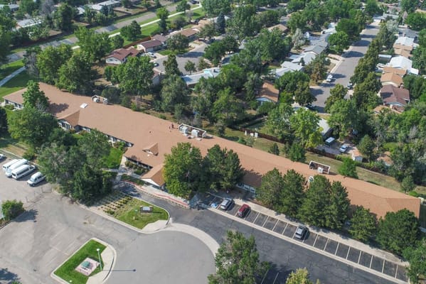 Aerial view of an assisted living facility and surrounding area