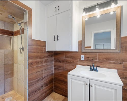 Modern bathroom with shower and vanity