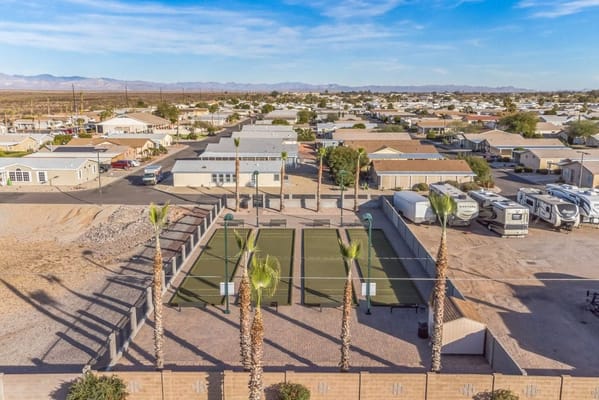 Aerial view of outdoor recreational area with courts