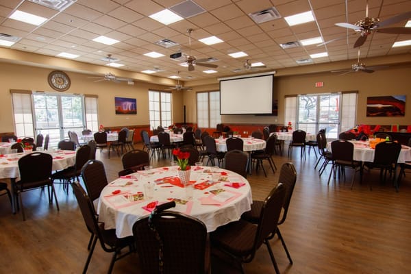 Indoor dining room with tables set for a meal