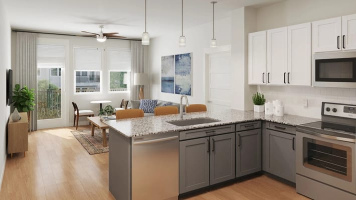 Stylish kitchen with living area featuring a table and chairs