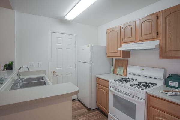 Bright kitchen area with modern appliances