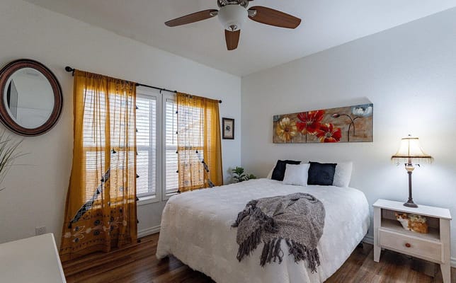Warmly decorated bedroom with natural light