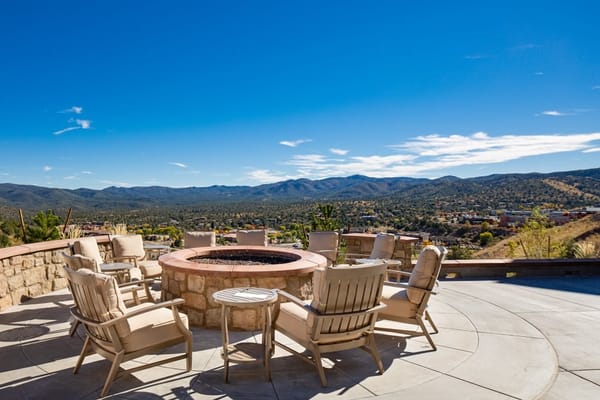 Outdoor seating area with a scenic mountain view