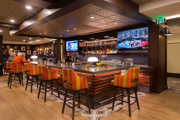 Interior of a bar area with residents seated
