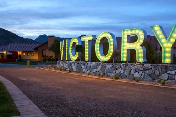 Exterior view of the Victory sign at the facility