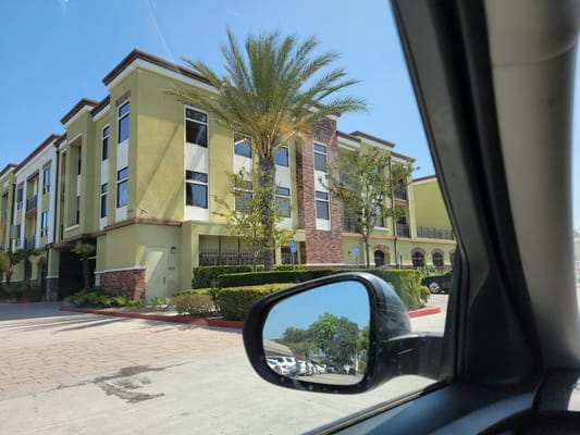 View of the exterior of Ramona Park Senior Apartments from the street