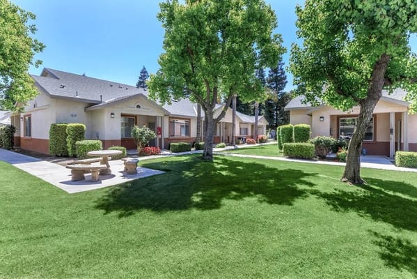 Outdoor view of landscaped grounds and resident units