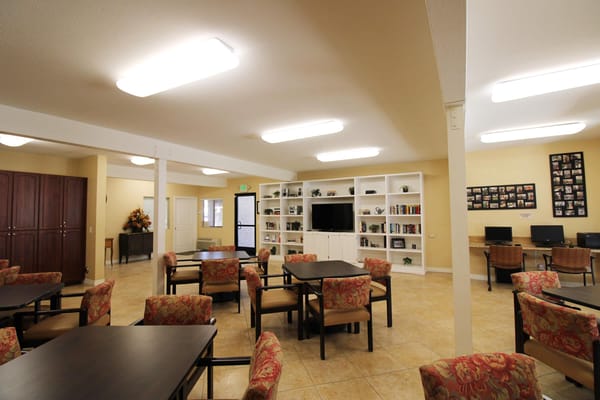 Interior common area with seating and shelves