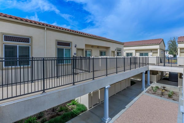 Exterior view of Monte Vista Senior Apartments with blue skies