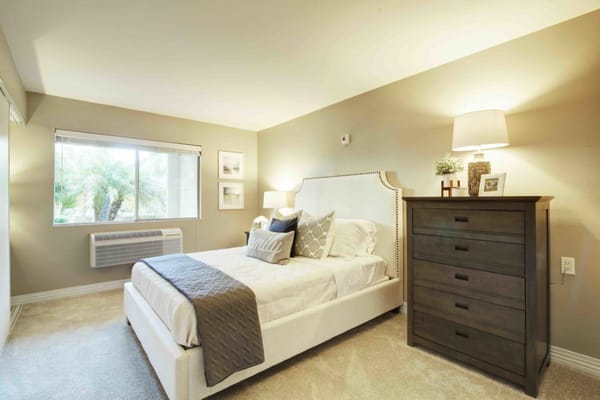 A well-decorated resident room with natural light