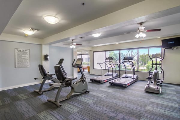 Interior view of a fitness room with exercise equipment