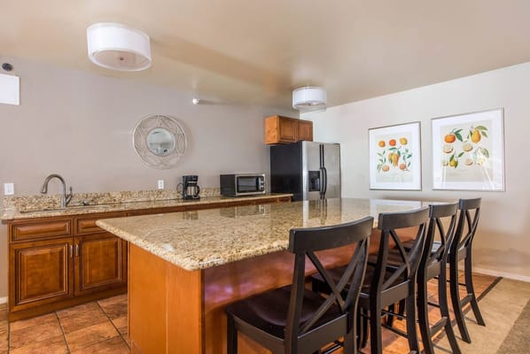 Spacious kitchen featuring granite countertops and modern appliances