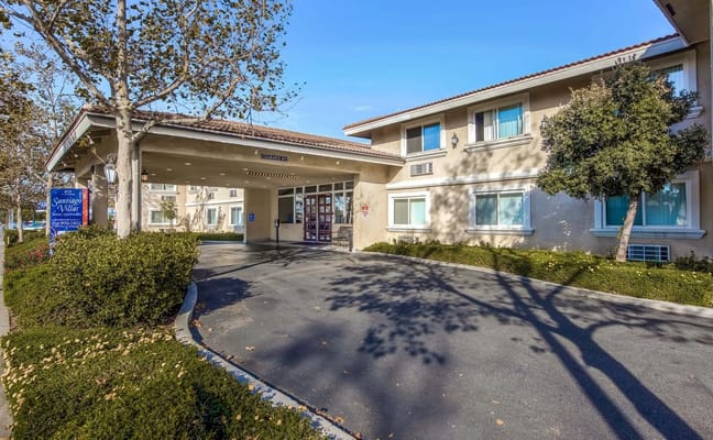 View of the entrance of Santiago Villas Senior Apartments in Santa Ana, CA